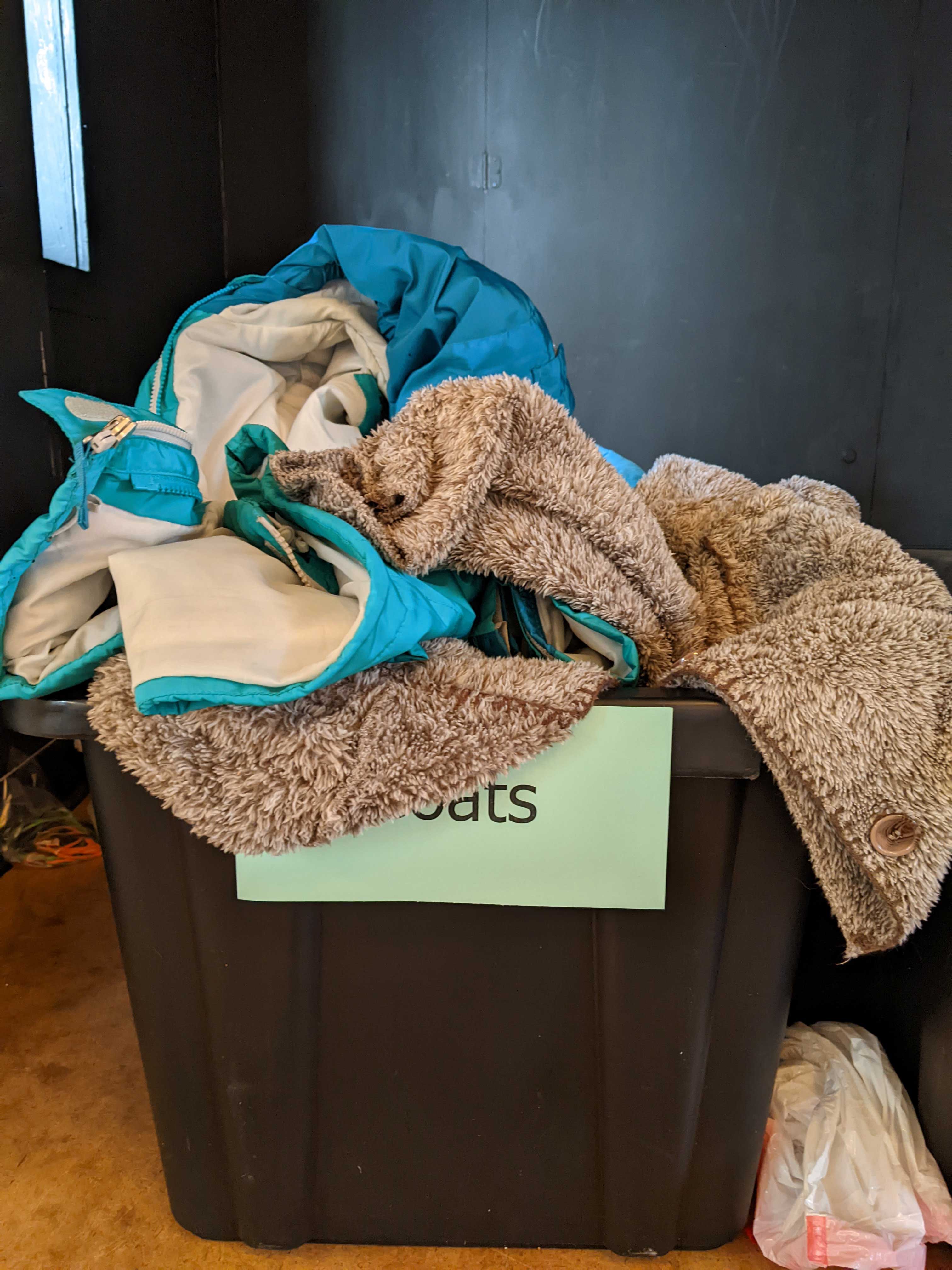 Open House photo of coats donated.